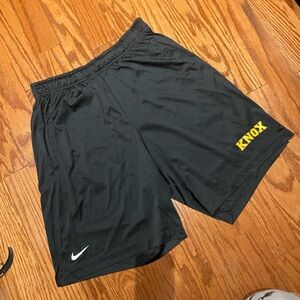 Nike Black Athletic Shorts with Yellow Logo
